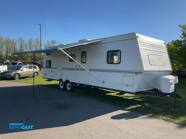 Lot 2-TBD - 2001 Jayco Eagle SE3 14 Camper Travel Trailer (Fully remodeled interior with new sofa sleeper couch)