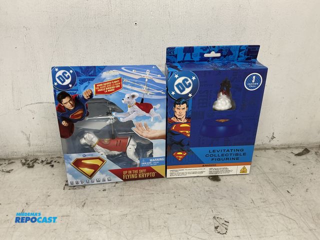 Lot 2-75514 - DC levitating super man collectible and super man dog helicopter.