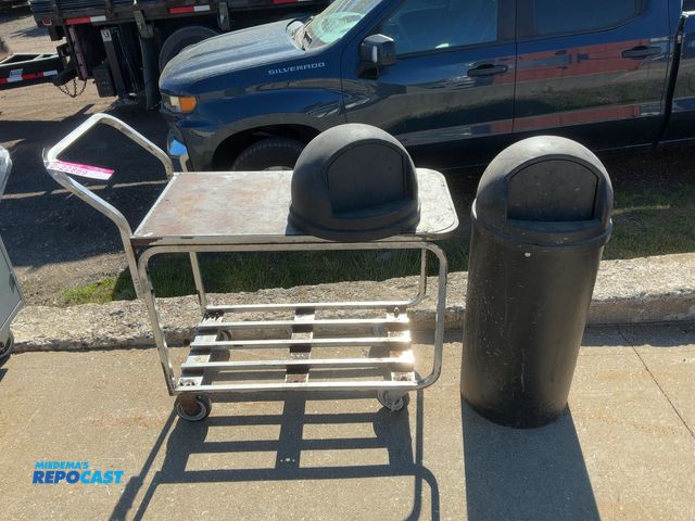 Lot 2-22889 - Lot of (1) 2-tier Metal Cart on Casters, 18-1/2”x36”x29” tall and (1) Rubbermaid Trash Can with Extr...
