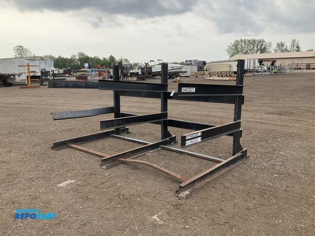 Lot 2-34496 - Metal cantilever rack 123-3/4”W x 78” x 66”T overall, 60”L rack arms - one is twisted and a couple a...