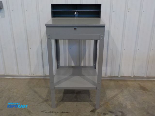 Lot 2-34144 - U-Line personal work station. Flip up storage. Bottom shelf. Upper cubbies.  24" w x 23" d x 50" h