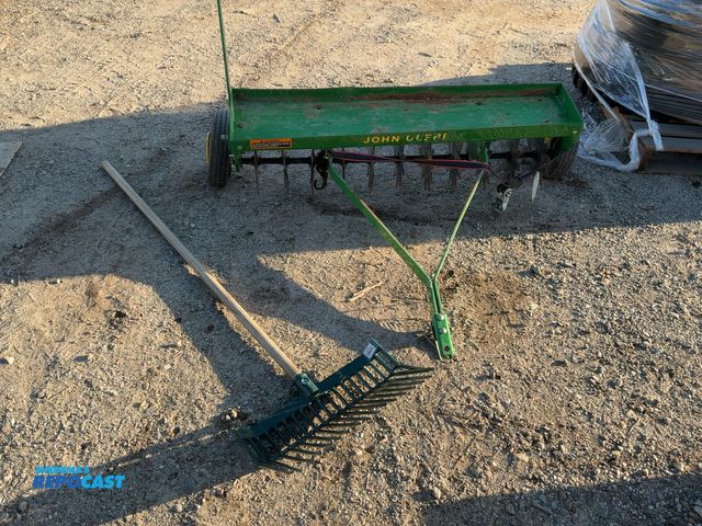 Lot 2-33110 - John Deere 42” tow behind aerator and a dua fork pitch fork
