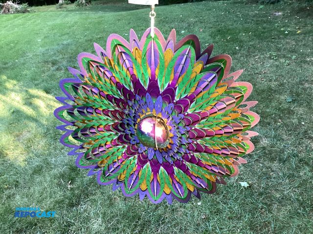 Lot 2-77798 - New Spinfinity Designs wind spinner. Stainless Steel Metallic finish shimmers in the sunlight and tw...