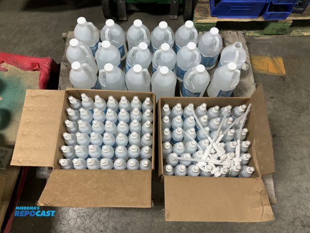 Lot 2-67681 - Skid lot of The Upper Hand, hand sanitizer (17) 1/2 gallons and (2 boxes) 8oz spray bottles