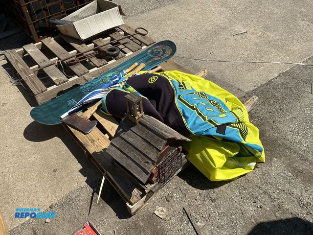Lot 2-76600 - Wooden birdfeeder, a LTD139 Muse* board, (2) umbrellas, a axe, and a Obrien super screamer 2-person ...
