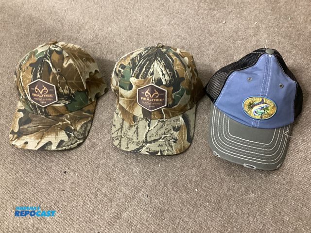 Lot 2-67330 - Three new hats. Two are RealTree hunting hats and one is a Panama Jack fishing hat.