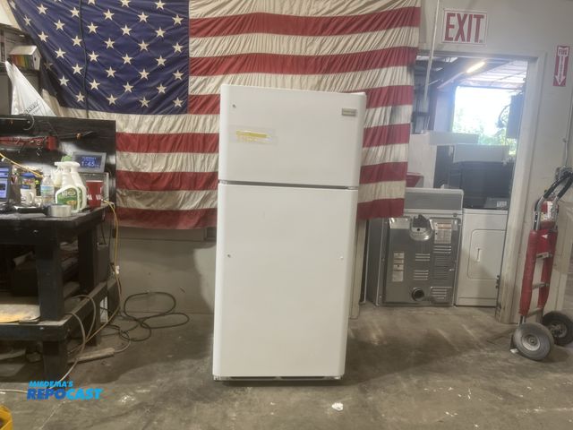 Lot 2-59384 - Frigidaire freezer on top Refrigerator/Freezer adjustable freezer shelf
door storage