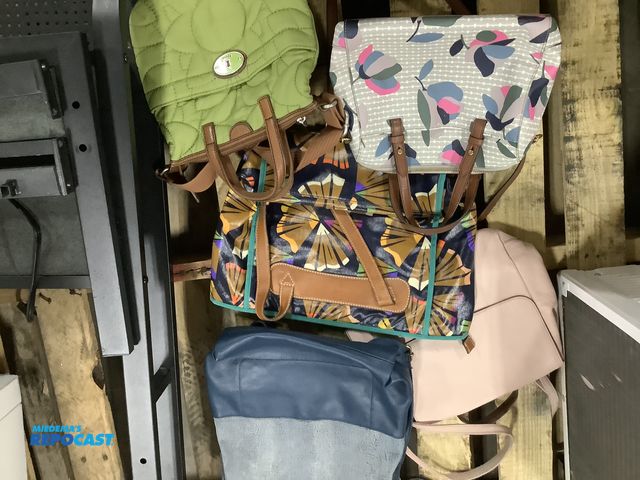 Lot 2-67002 - White Christmas paper bag filled with assorted 5 purses some long straps, and short and zipper and c...