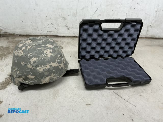 Lot 2-35434 - pistol gun case and air force helmet, used in desert storm