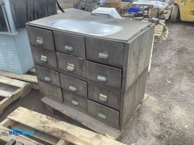 Lot 2-32828 - 12 drawer storage desk with misc. industrial components inside