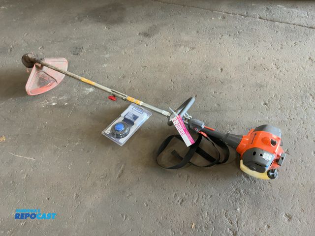Lot 2-20046 - Husqvarna 128LD String Trimmer, comes with new extra trimmer head, Runs and Works