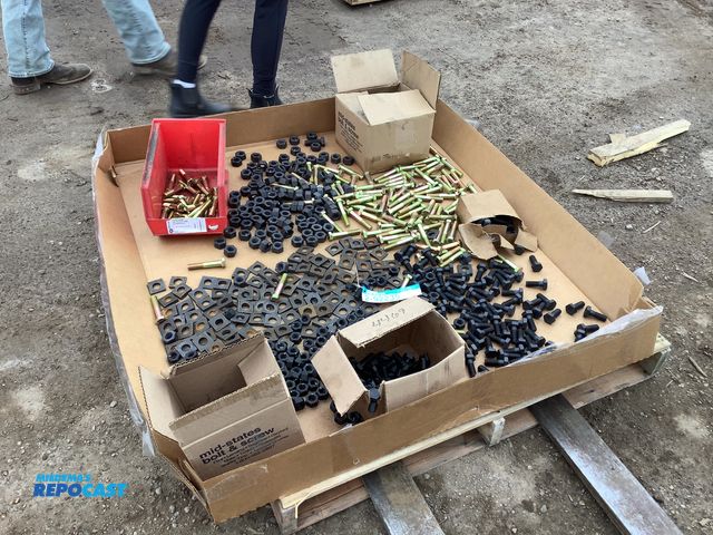 Lot 2-92235 - Skid lot of various nuts and bolts, 2 different types of bolts, round nuts, and other parts