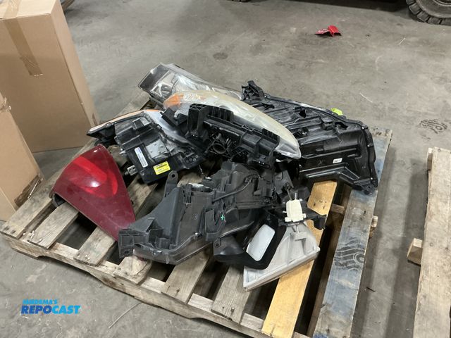Lot 2-19438 - Skid lot of various taillights and headlights