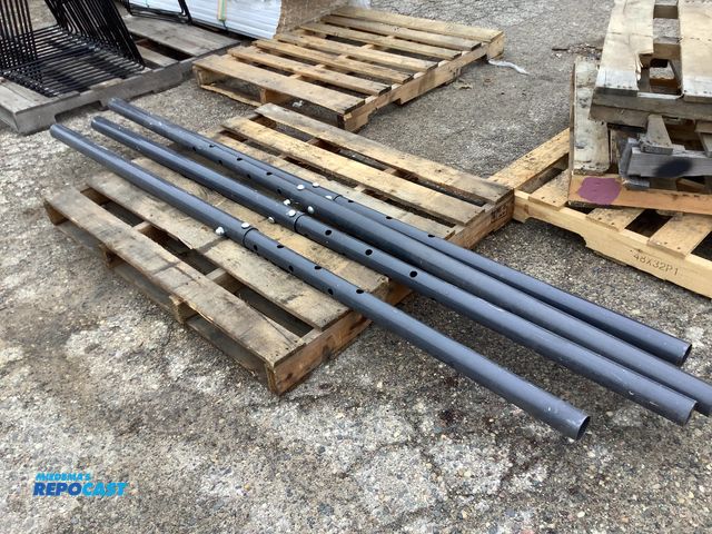 Lot 2-93497 - 4 black metal poles with 4 notches each to adjust length longest length set at 90”