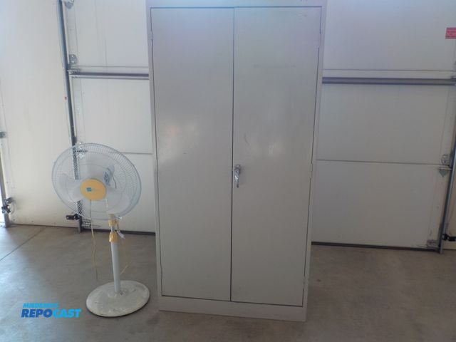 Lot 2-34078 - Two door storage cabinet. Multiple shelves. 36"w x 18"d x 72" h. Variable speed fan.