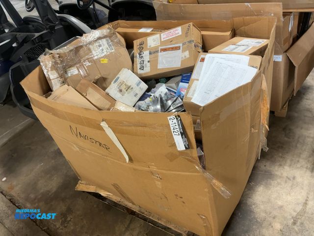 Lot 2-11427 - Skid of assorted new semi truck parts including filters, DEF Tank, A/C Hose, Circuit Breakers, Hub C...