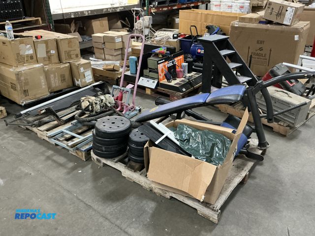 Lot 2-23811 - (TWO SKIDS) proline lawn mower lift, Marcy blue/black weight bench with extra weights, a green intex...