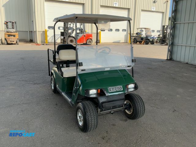 Lot 2-91893 - 2010 E-Z-Go TxT 4-Seater Golf Cart w/ Light Kit and Battery Charger