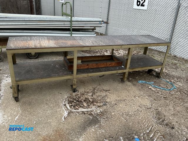 Lot 2-60422 - 8' welding table with automatic brakes and wheels