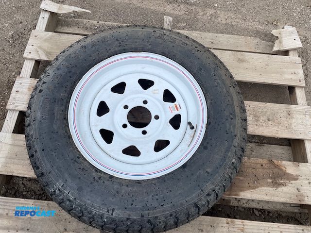 Lot 2-72720 - New Loadstar trailer tire and rim, ST205/75D15