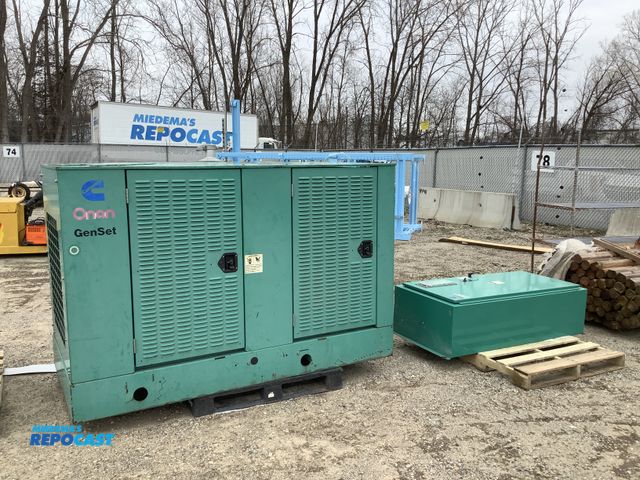 Lot 2-60856 - Onan OTC-3366407 50kva with transfer switch natural gas cummins can be converted to diesel generator...