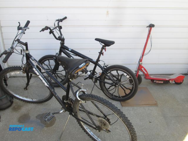 Lot 2-59067 - 2 bikes, mongoose, 20" wheels, Rebel, Huffy 26" mountain, Razor E100 Electric scooter (untested)