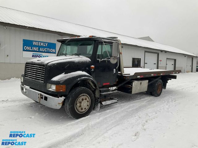Lot 2-61019 - 1996 International 4700 4X2 Car Hauler Flatbed Truck