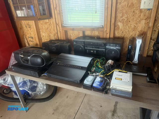 Lot 2-18771 - Lot of various electronics, includes: three portable stereos (runs, but some functions need repair),...