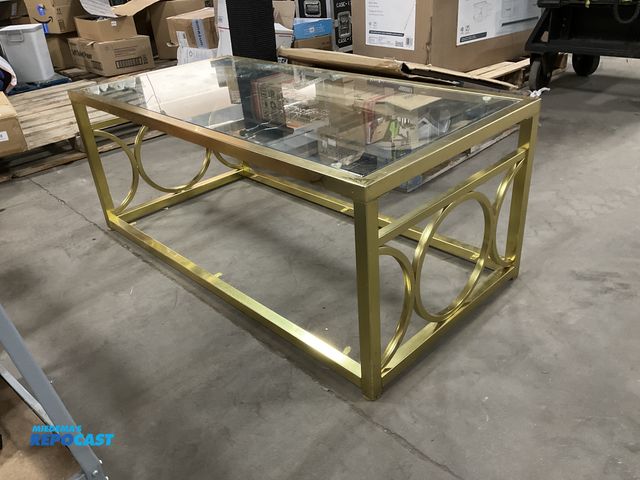Lot 2-65610 - Other (1) 47” width x 18” height x 23.5” metal framed coffee table with glass top insert. (Missing l...