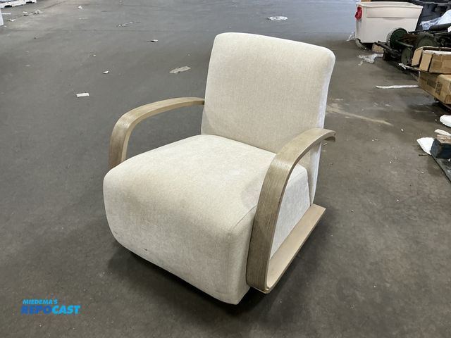 Lot 2-96343 - Beige lounge Chair - has some stains and is cracked (tilted)