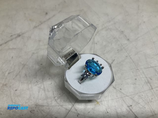 Lot 2-28518 - Silver size 9 Ring with sky blue diamond - new