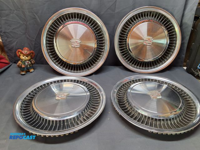 Lot 2-27890 - (4) VINTAGE 1974/1975 CADILLAC FLEETWOOD DEVILLE SEVILLE HUBCAPS