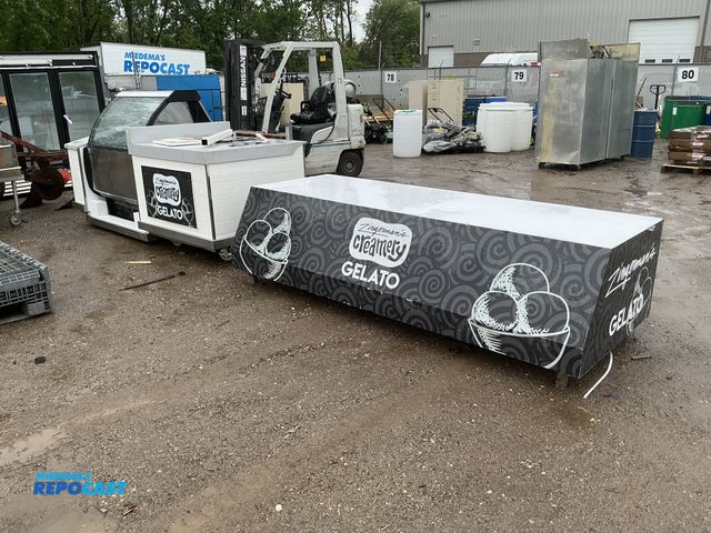Lot 2-76327 - Lot of (1) Zingerman’s creamery gelato station, on wheels, one of the doors needs fixing, 108”x43”x5...