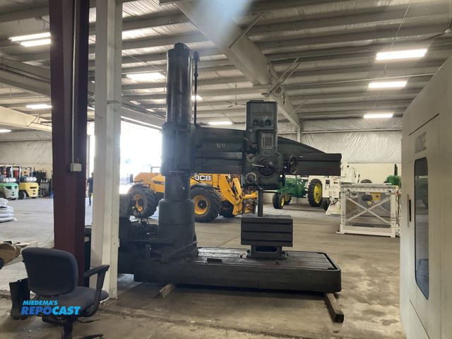 Lot 2-30573 - Carlton 15” x 5’ radial arm drill press, 15” column diameter, 5’ arm, 28”L x 21”W drill table, spind...