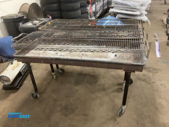 Lot 2-33690 - (2) Used 5’ Charcoal Grills, on casters, 24”x60” grill area, showing wear/damage