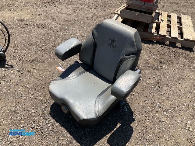 Lot 2-44098 - Exmark spring suspension seat for a mower, used