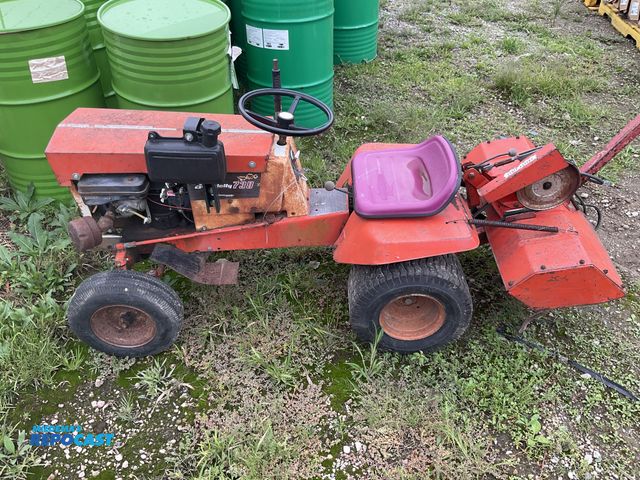 Lot 2-27883 - Vintage Simplicity 738 garden tractor with 32" Simplicity tiller attached.