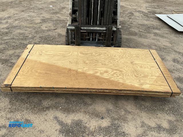 Lot 2-11579 - Stack of Treated Plywood - approx. 4’ x 95”