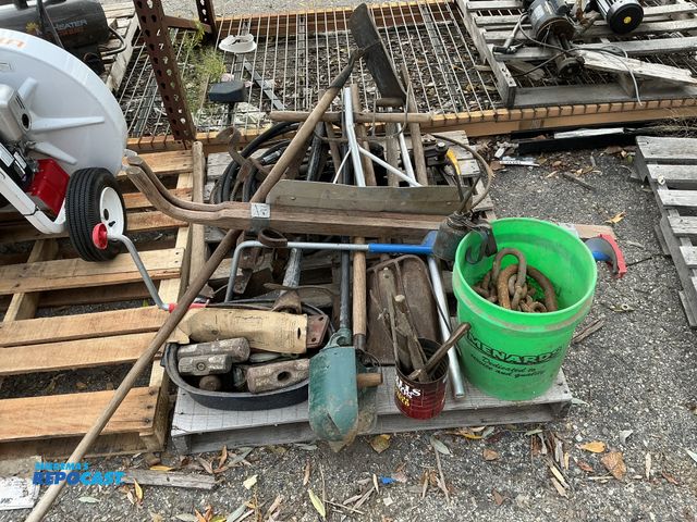 Lot 2-62941 - Large lot of a variety of vintage hand tools, including pitchforks, post diggers, chains, files, and...