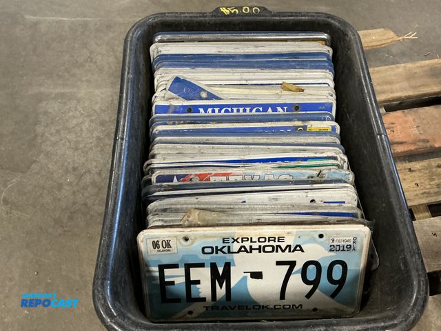 Lot 2-67987 - Box of Assorted License Plates