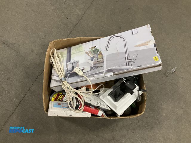 Lot 2-67992 - Box of faucets, fishing reels, paint supplies, and more