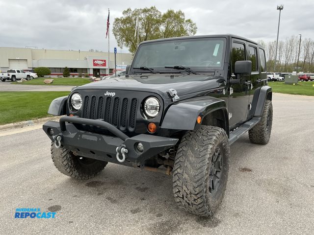 Lot 2-29404 - 2013 Jeep Wrangler Unlimited Sahara SUV 4x4