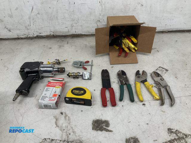 Lot 2-33356 - Lot of assorted misc tools including: clamps, strait-line laser level, ground fault circuit interrup...