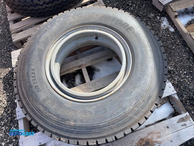 Lot 2-72674 - 1 Recapped Bridgestone 11 R 22.5 tire with rim.