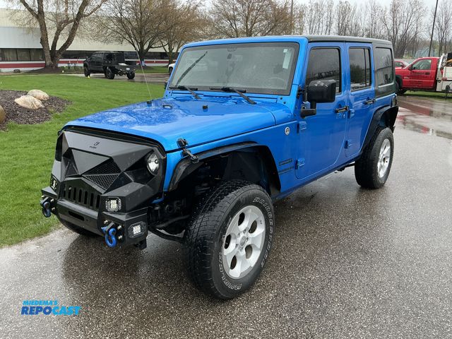 Lot 2-42276 - 2015 Jeep Wrangler Unlimited Sport 4WD SUV 4x4