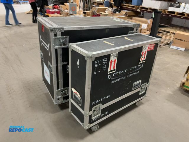 Lot 2-65667 - 2 Assorted size lockable rollable musical instruments storage containers 41” x 38”x 13” and 26”x 46”...