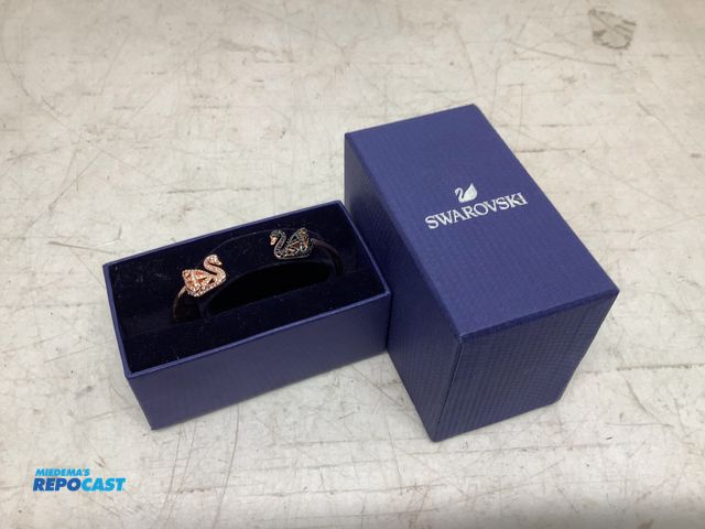 Lot 2-74035 - New Swarovski faucet gradient swan bracelet, rose gold plated design with crystal pave’ accents