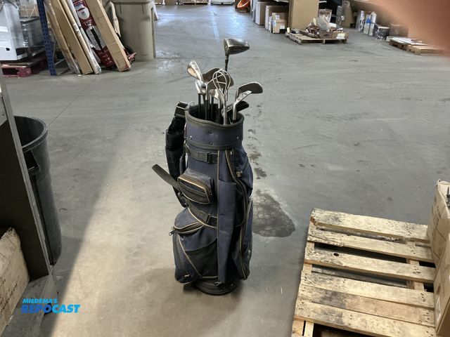 Lot 2-74658 - Set of Right Handed Axis Titanium Golf Clubs with Carrying Bag