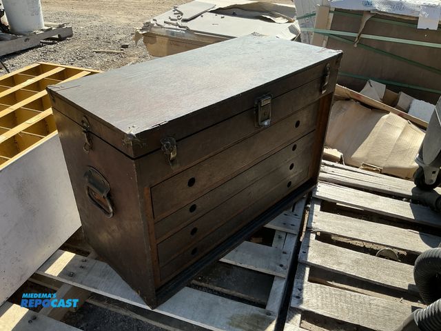 Lot 2-76748 - Dark wooden old chest small compartment with 4 drawers and 5 clips to keep shut and handles for carr...