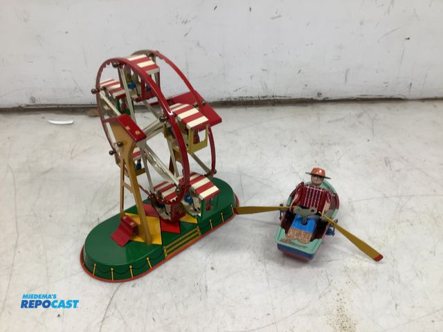 Lot 2-64374 - 2 wind up toys, Ferris wheel with wind up key attached and wind up tow boat with wheels